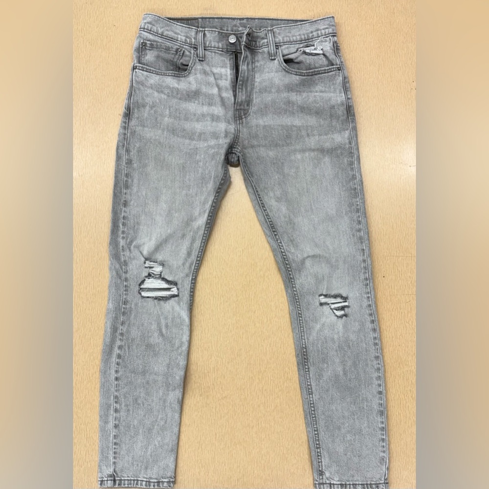 Levi’s 512 distressed jeans